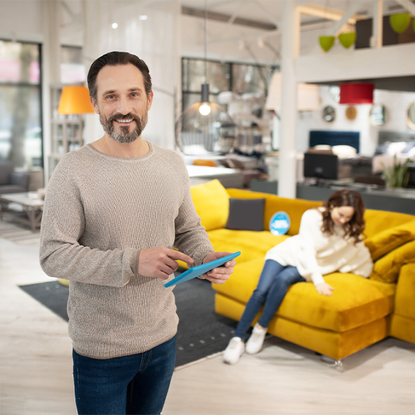 Worker holding produce