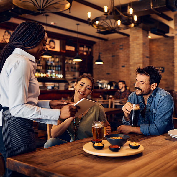 Worker holding produce